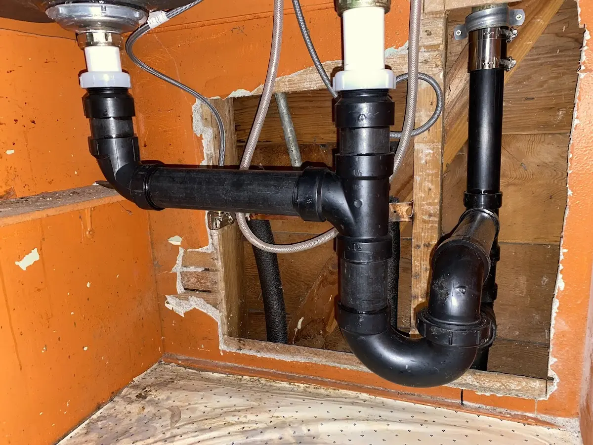 Professional Garbage Disposal Repair equipment and tools on the job in Waynesburg